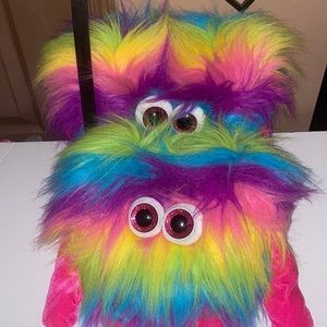 2 Rainbow colored, heart shaped plush toys